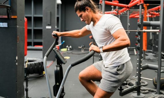 A man working out on an exercise bike